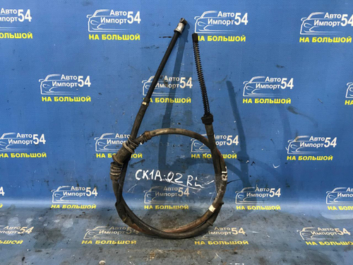 Трос ручника левый MITSUBISHI LANCER 2000