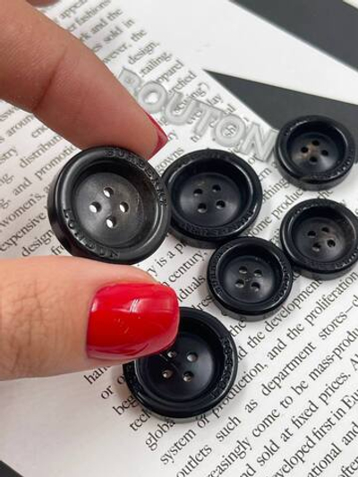 Пуговицы Барб. черные с прожилками и высокими бортиками (натуральный рог)