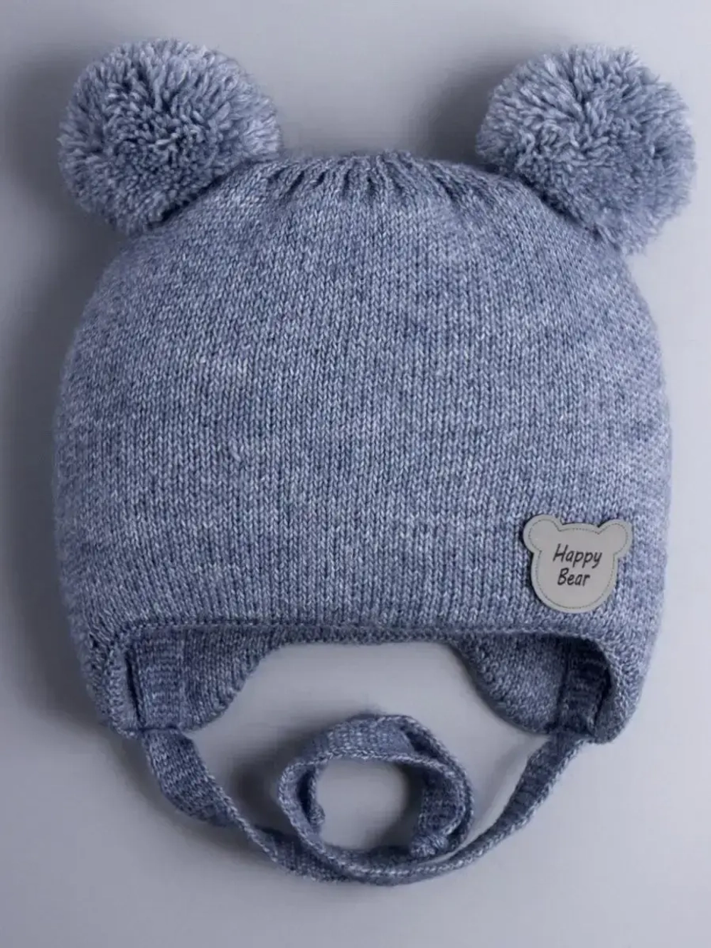 Шапка детская осенняя с завязками и помпонами