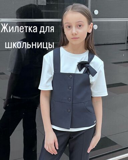 Жилетка с бантиком