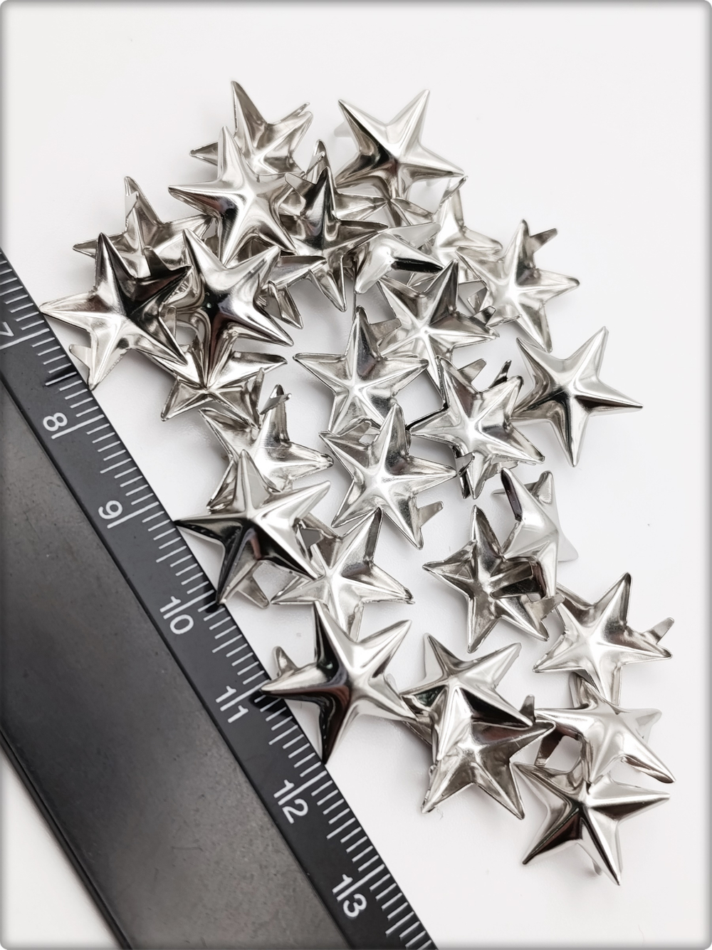 Клепки "Звёзды" серебристые с цапами для декора.