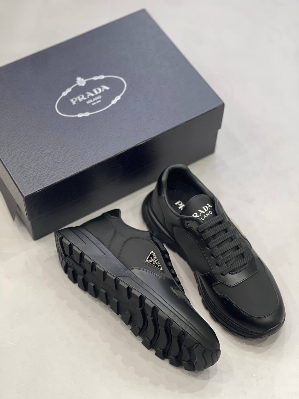 Кроссовки Prada