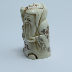 Нэцкэ Фукурокудзю с мешком риса на плече