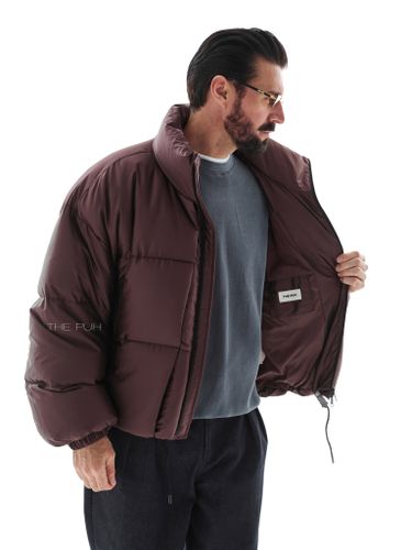 Короткий стеганый пуховик в цвете шоколад