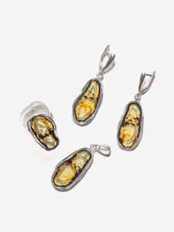 Уникальный серебряный кулон с цельным янтарем, серебро 925 пробы