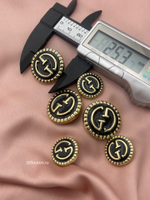 Пуговицы Гучч. золотистые с черной эмалью