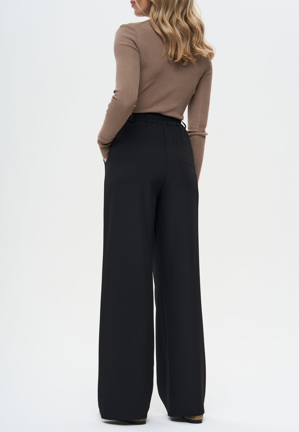 Брюки с простроченными стрелками