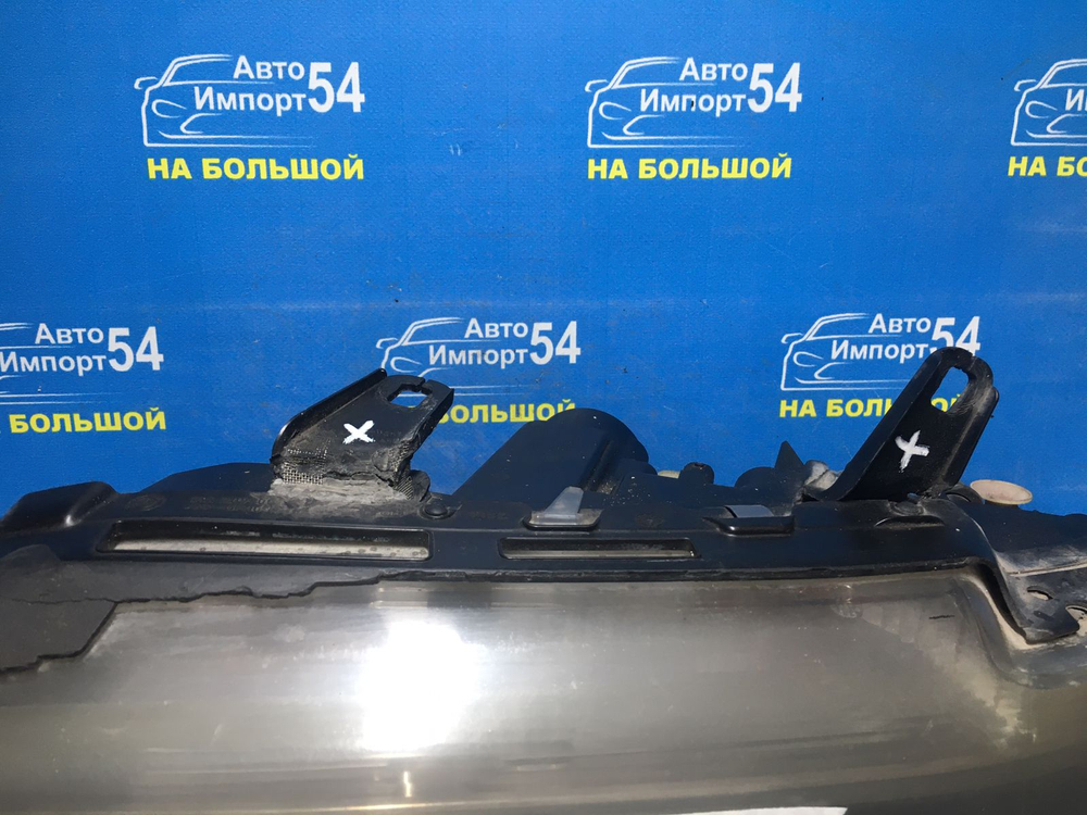 Фара передняя левая BMW 7-Series 2004