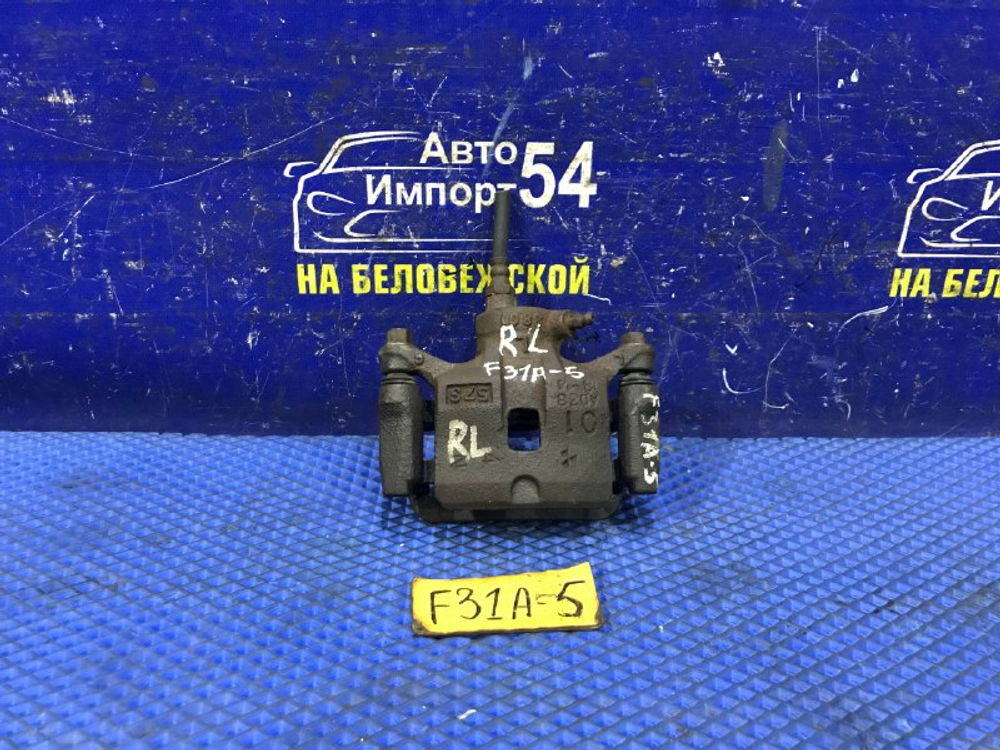 Суппорт тормозной задний левый MITSUBISHI DIAMANTE 2000