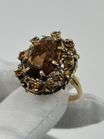 Кольцо с коричневыми кристаллами