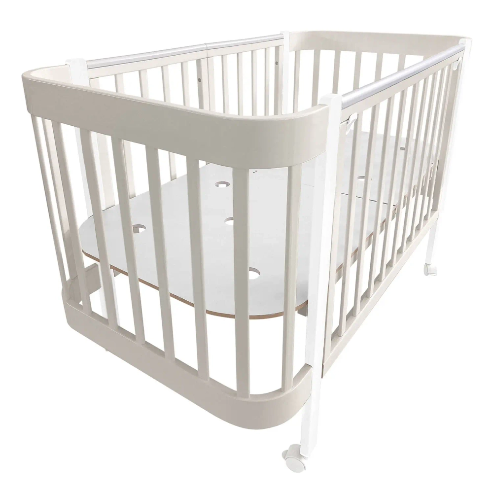 Кровать детская Indigo Italiano Baby продольный маятник на колесах кашемир-белый