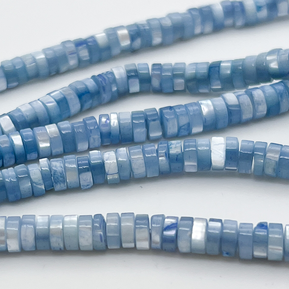 Перламутр тонированный, цвет синий, размер около 5*2 мм, цена за 83-84 шт (1/2 нити)