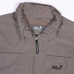Ветровка Jack Wolfskin в винтажном стиле и сероватом оттенке бежевого, S свободный