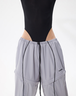 GREY TRANSFORMING  TRACKPANTS