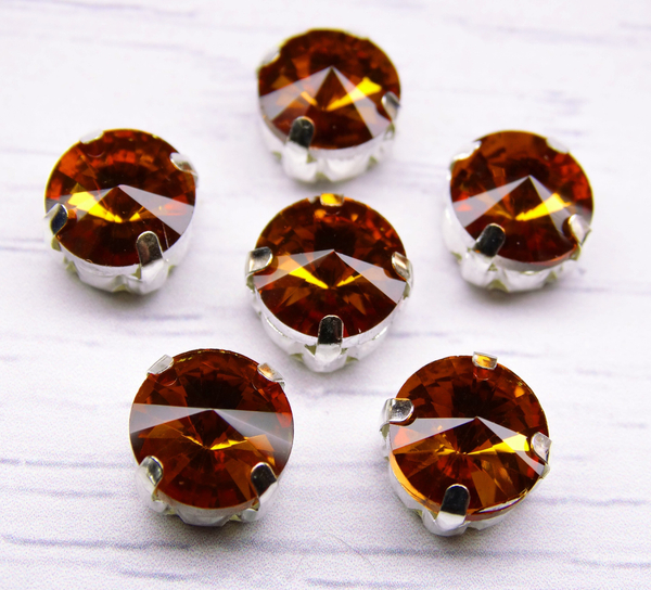 РЦ007НН10 Хрустальные стразы круглой формы в цапах "риволи", цвет: янтарный, размер: 10 мм, 7 шт.