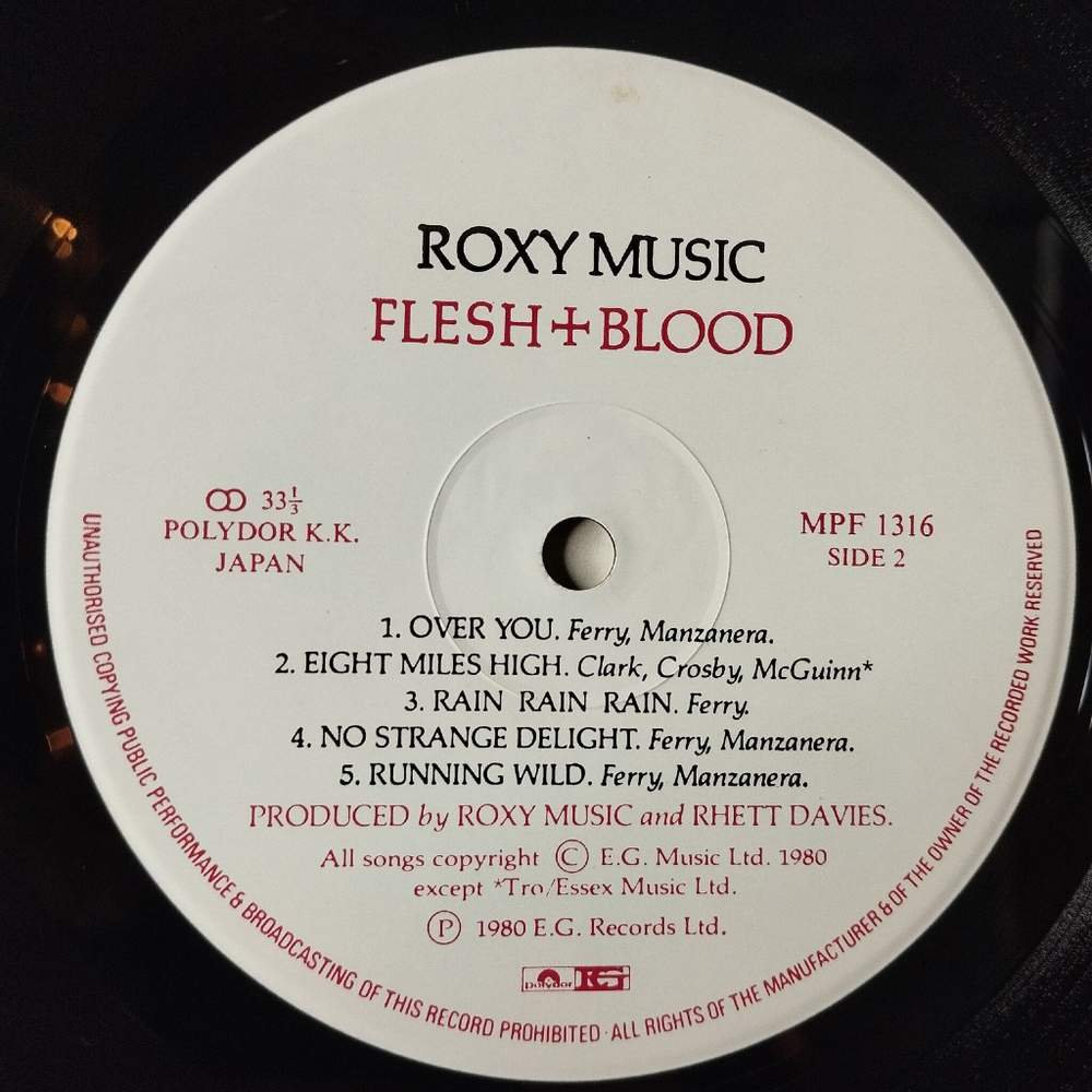 Винтажная виниловая пластинка LP Roxy Music Flesh and Blood (Japan 1980) (Obi)