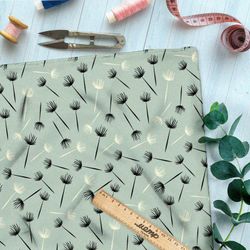 Ткань бифлекс пустые одуванчики на зелёном фоне