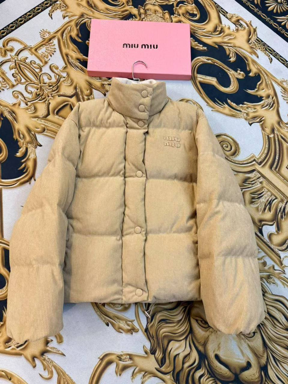 Пуховик MIU MIU
