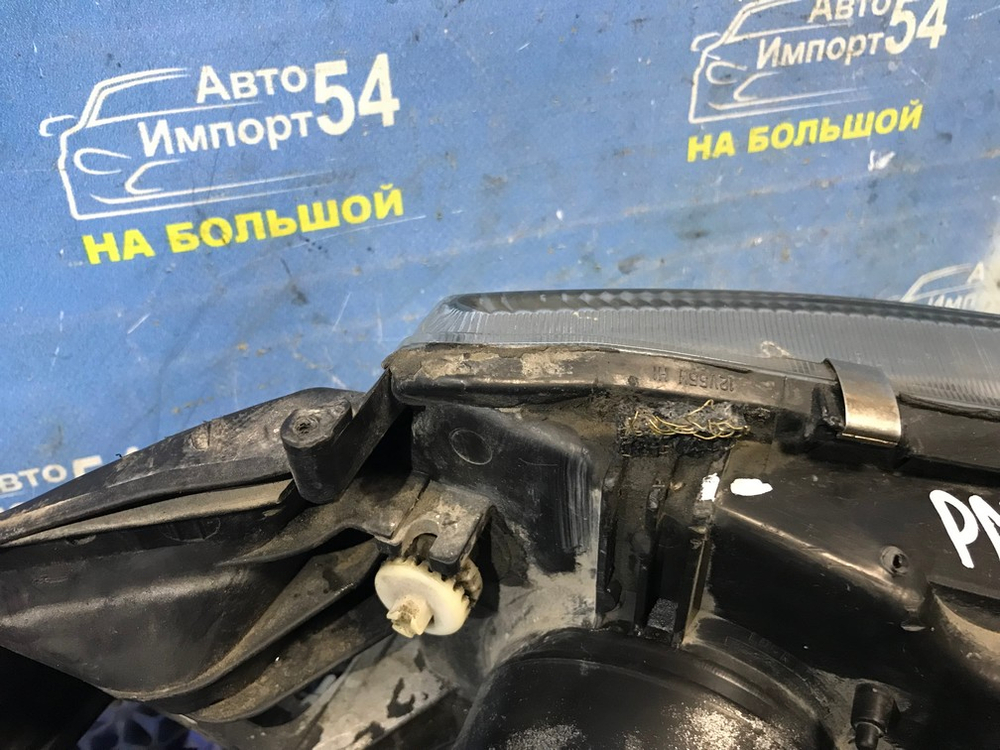 Фара передняя левая NISSAN LIBERTY 1999