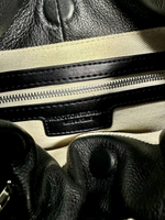 Женская сумка-кисет черного цвета