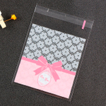 Упаковочные пакетики со скотчем и рисунком для подарков