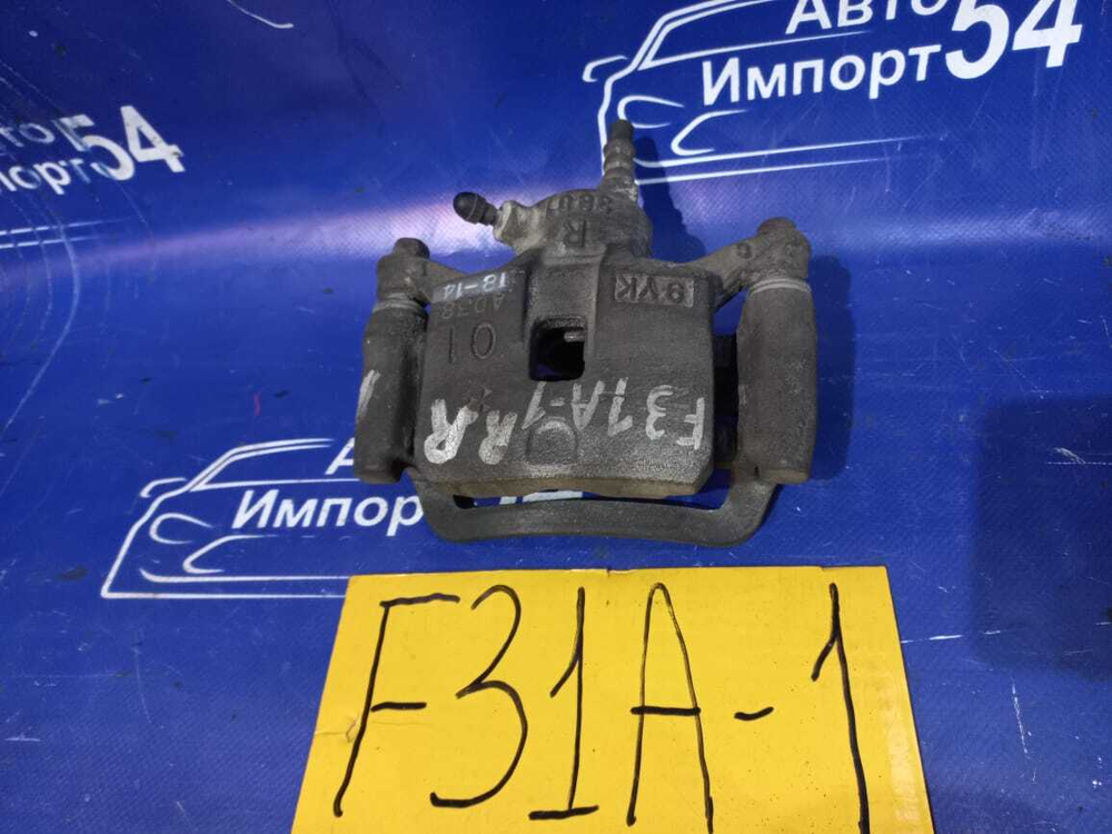 Суппорт тормозной задний правый MITSUBISHI DIAMANTE 2000