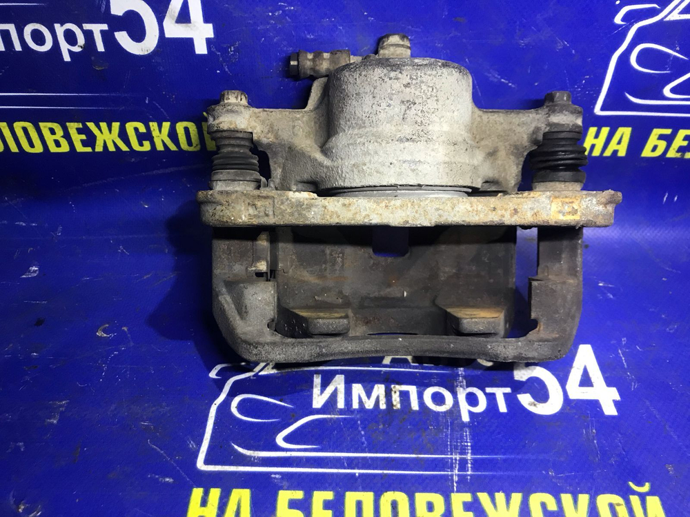 Суппорт тормозной передний левый Honda INTEGRA 1995
