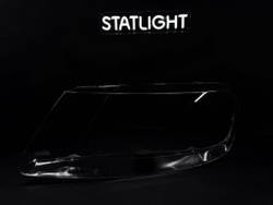 Левое стекло фары Volkswagen Touareg 2002-2007