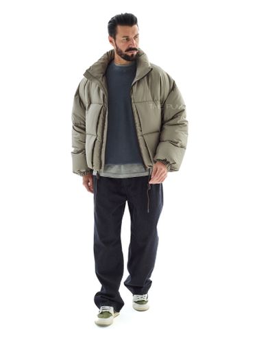 Короткий стеганый пуховик в цвете хаки