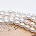 "Майорка" рис, цвет белый, размер около 8*6 мм, цена за 22-23 шт (1/2 нити)