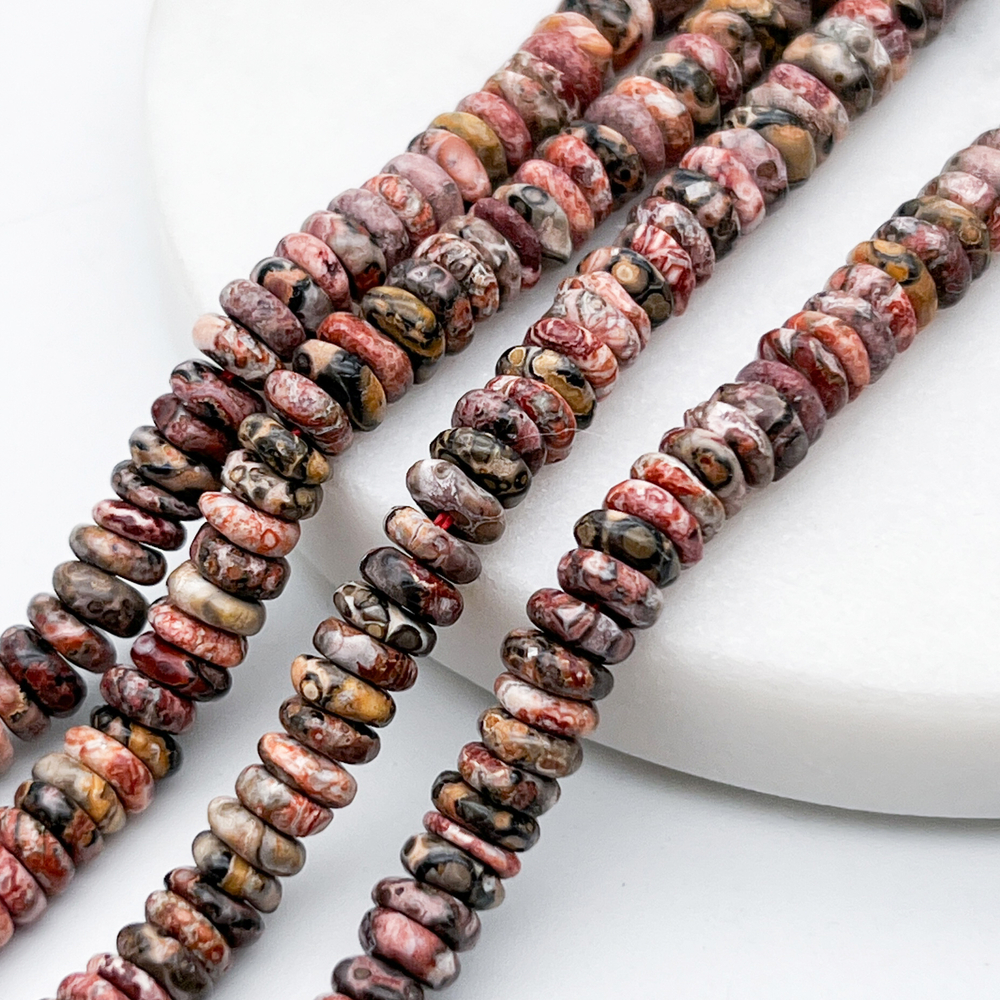 Риолит бусины, рондель, размер около 1,8-2,5*5,5-6 мм, цена за отрезок 19 см (1/2 нити)