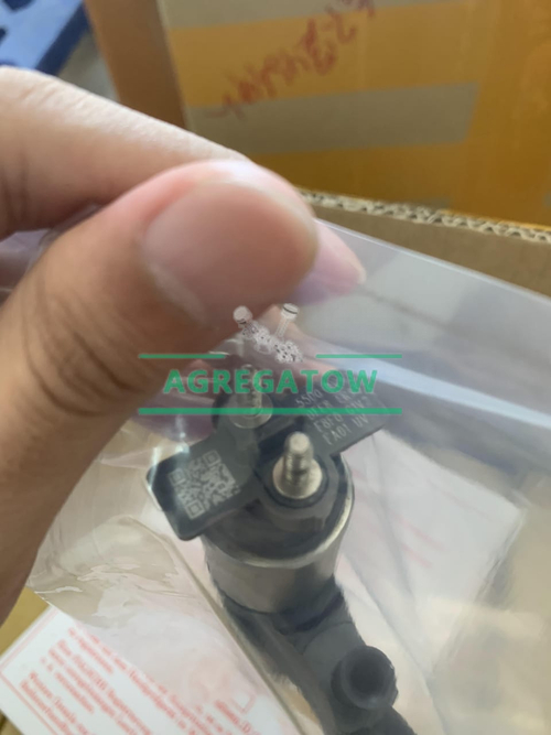 Форсунка топливная Denso 095000-6700 / 61540080017