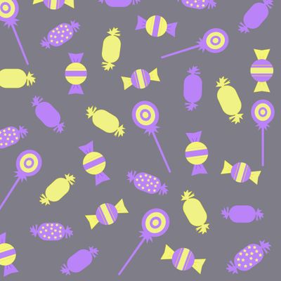 Конфеты в сиреневых и желтых тонах на сером фоне