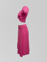 Костюм Fashion из удлиненной юбки с разрезом и топа в горошек