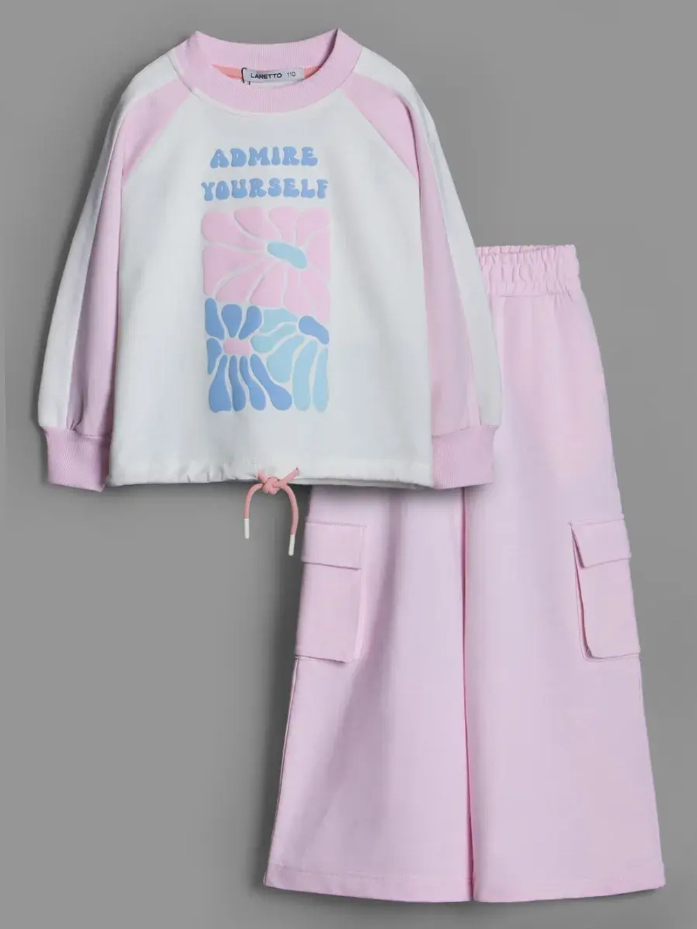 Розовый костюм для девочки на осень