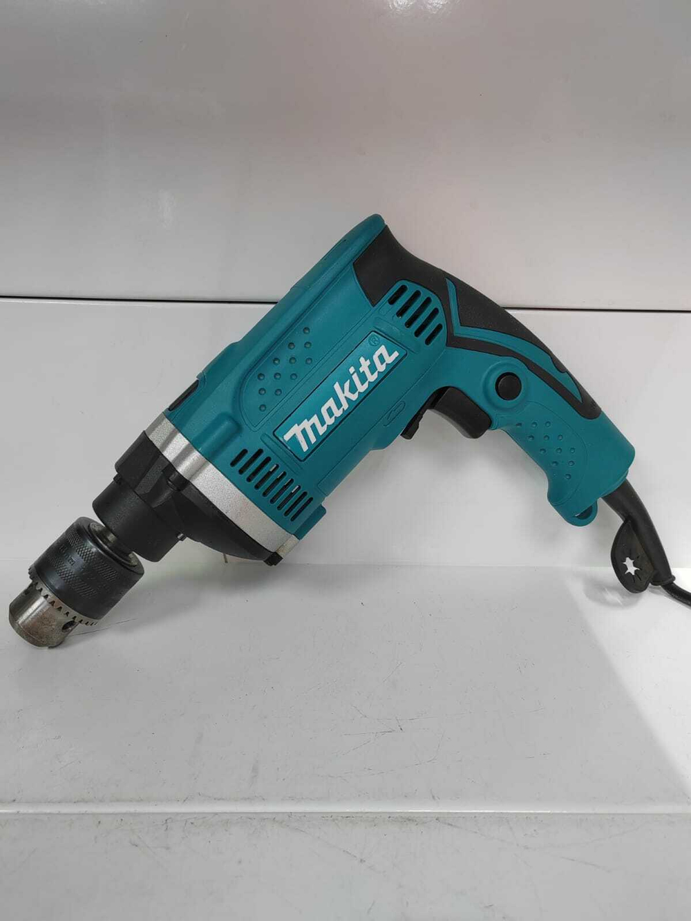 Дрель Makita HP1630