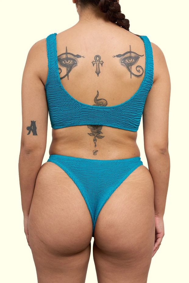 Топ купальника бирюзовый