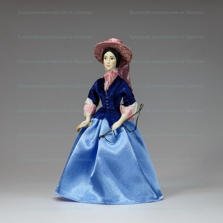 Сувенирная кукла в костюме для верховой езды