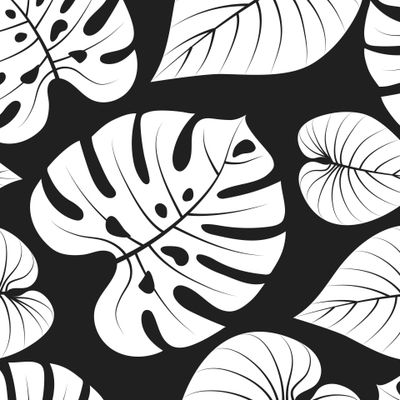 Черно-белый паттерн с тропическими листьями.