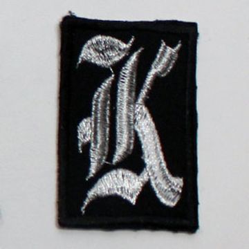 Нашивка буква "K" (серебристая)