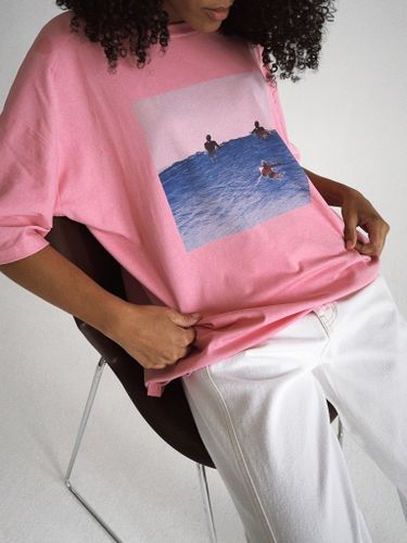 Розовая футболка оверсайз с принтом