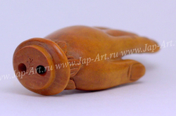 Нэцкэ Будда на ладоне