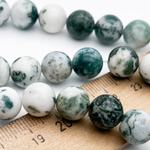 Моховый агат бусины (сорт Б), диаметр 10,2-10,5 мм, цена за 9 шт (1/4 нити)