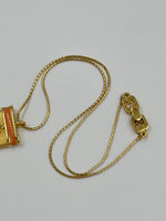 Кулон с лого и оранжевой эмалью Givenchy 1981 год