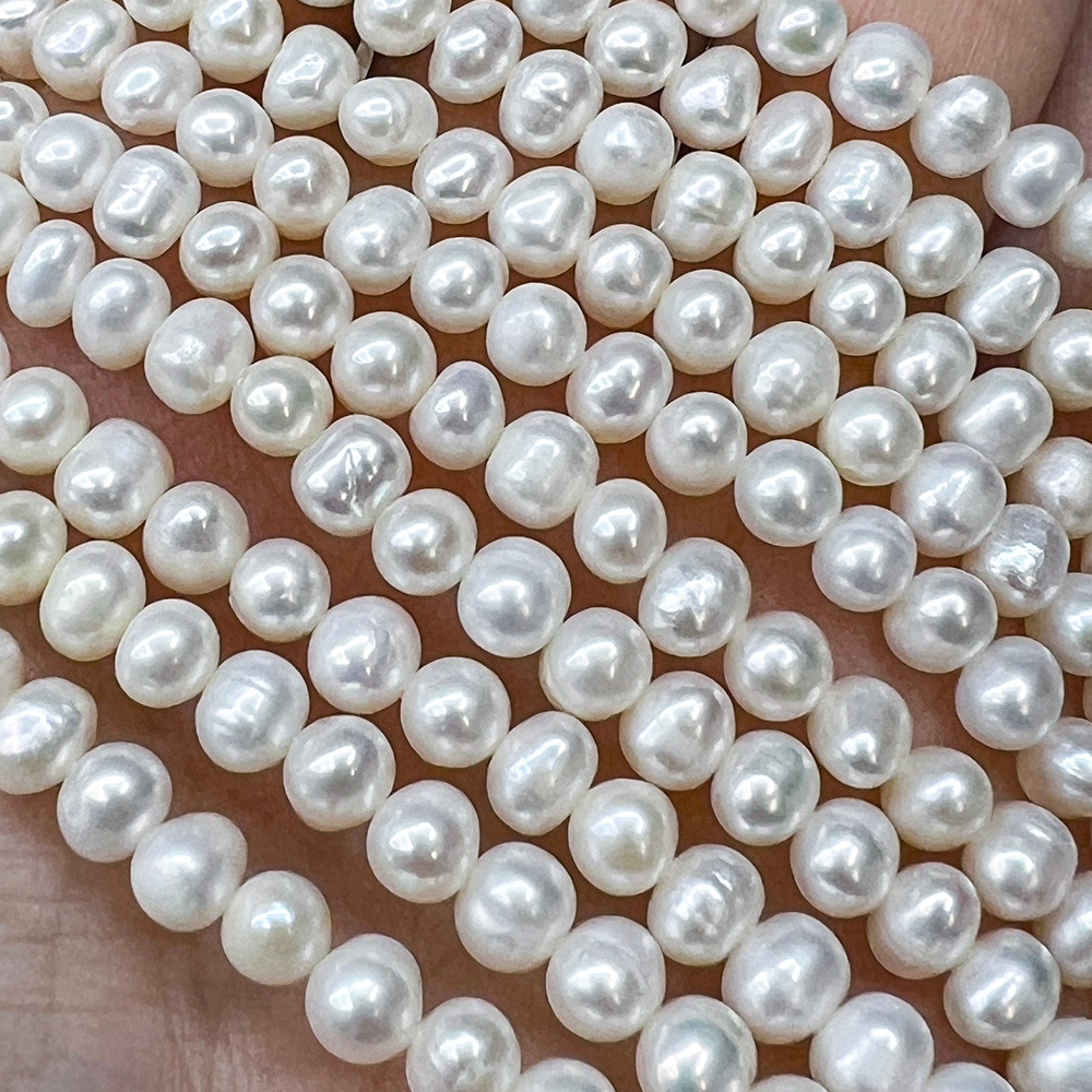 Жемчуг 2А речной бусины 4-5 мм, на нитке 38 см