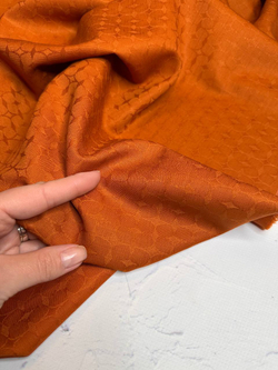 Костюмно-плательная однотонная жаккардовая шерсть с узором (COMME DES GARÇONS, 100%шерсть, Оранжевая охра, 142, 264 гр/м2)