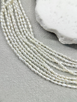 Натуральный барочный жемчуг супермелкий 1,5-2 мм, кремовый, нить 18 см