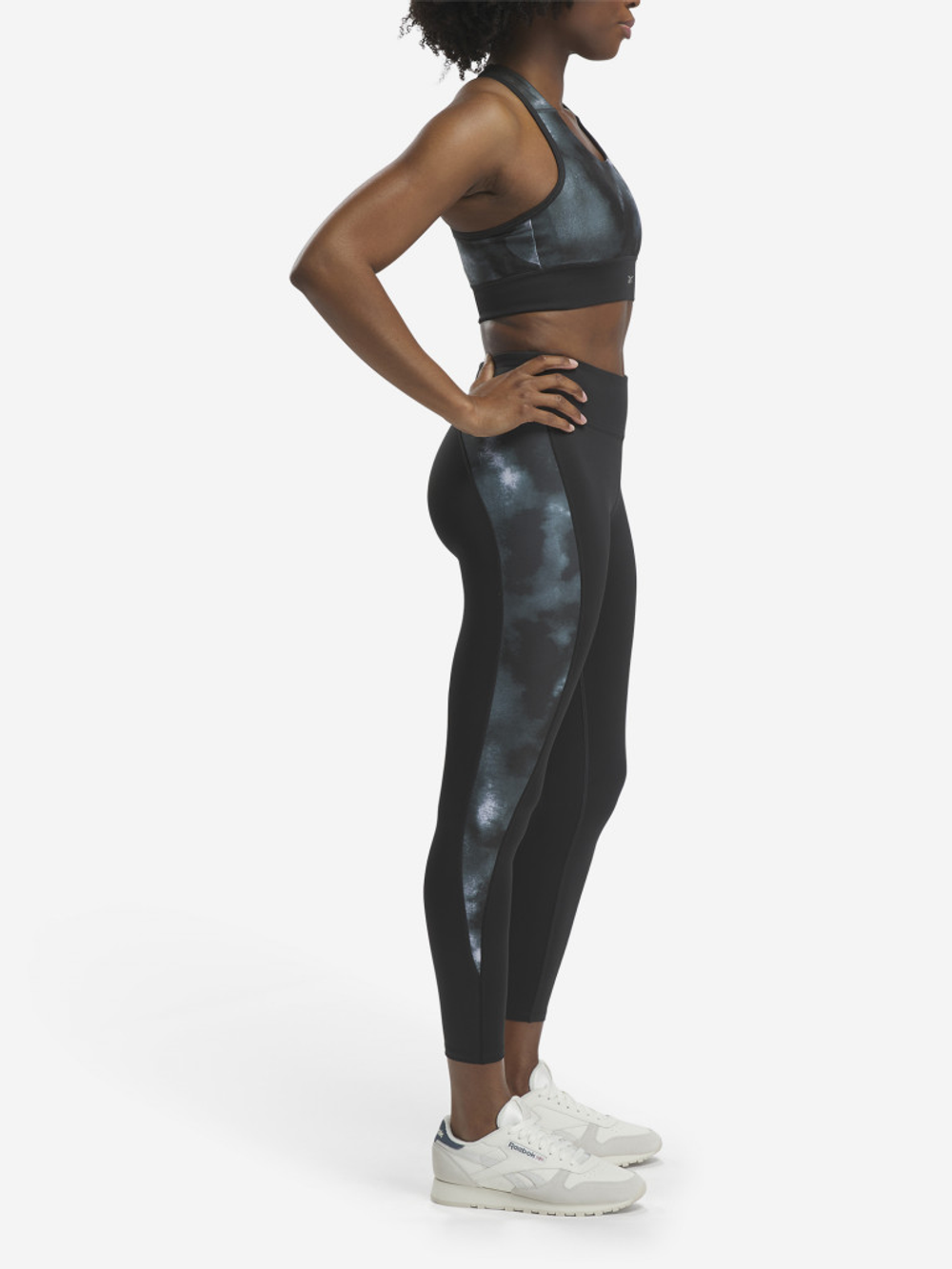 100034899 Тайтсы REEBOK женские