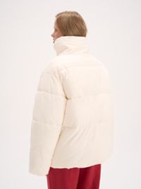 Пуховик стеганый "Молочный" женский