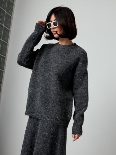 Трикотажный костюм с юбкой темно-серого цвета